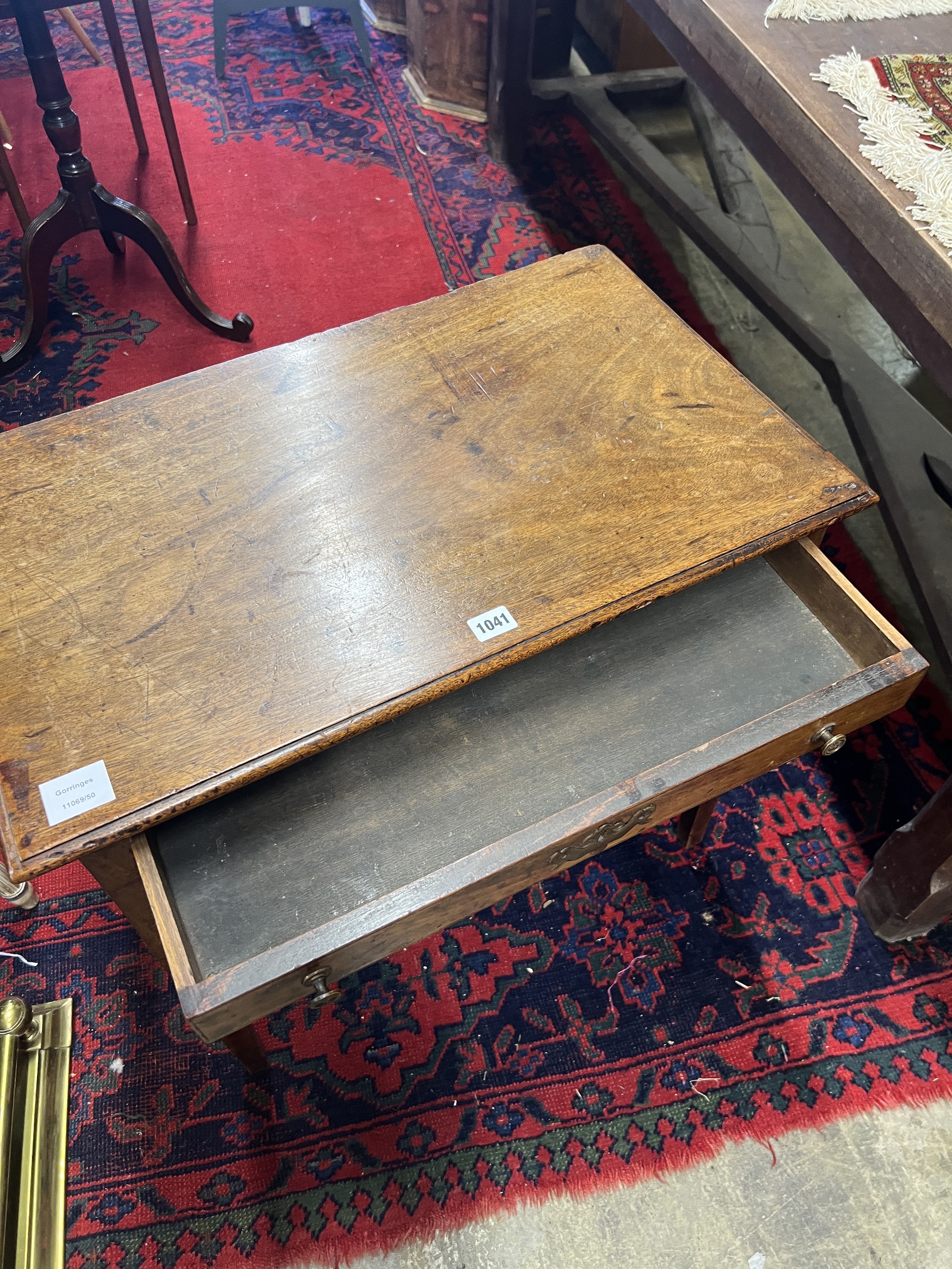 A George III mahogany side table with single drawer, raised on tapered squared legs, width 68cm, depth 40cm, height 65cm